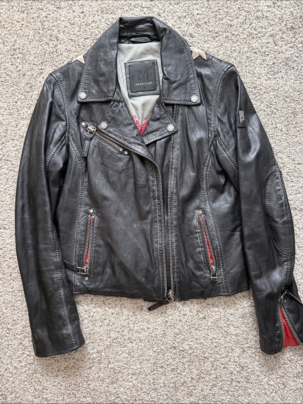 Mauritius Christy star Black Leather Biker Jacket with Red Zip Details